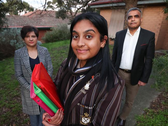 Cost of living and the rise in independent and private school fees. Parents Kiran and Sunny Jadhav, with their daughter Sachi 18, who is a year 12 Ivanhoe Grammar student.    Picture: David Caird