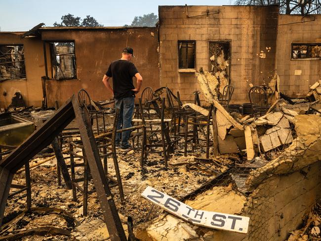 Chris Larson surveys the ruins of his business, the Rancho Bar, destroyed by the Eaton Fire in Altadena, California, on January 9, 2025. Picture: Zoa Meyers / AFP