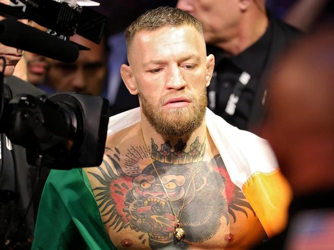 LAS VEGAS, NEVADA - JULY 10: Conor McGregor of Ireland walks through the arena before his lightweight bought against Dustin Poirier during UFC 264: Poirier v McGregor 3 at T-Mobile Arena on July 10, 2021 in Las Vegas, Nevada. (Photo by Stacy Revere/Getty Images) *** BESTPIX ***