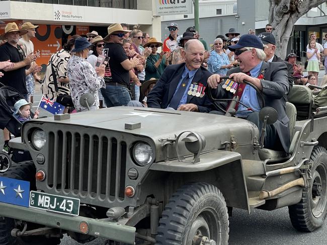 In a touching moment the parade came to a halt as a World War Two serviceman was brought aboard one of the leading jeeps. Photo: Fergus Gregg