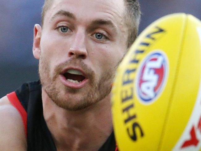 AFL Round 6. 24/04/2019. Richmond v Melbourne at the MCG.   Essendon's Devon Smith  clears b y hand 2nd quarter    . Pic: Michael Klein.