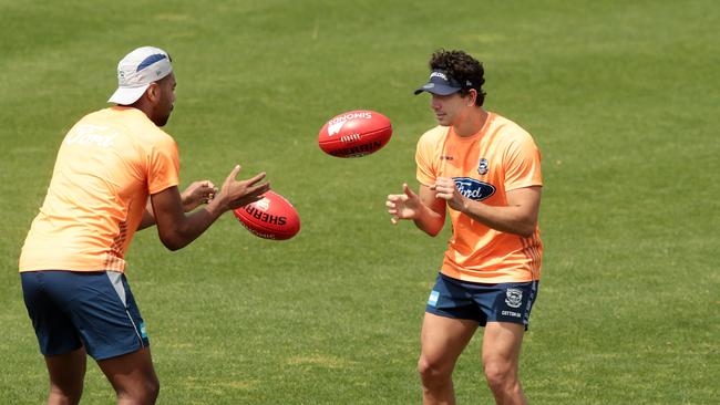 Esava Ratugolea (left) and Nakia Cockatoo at Cats training. Picture: Alison Wynd