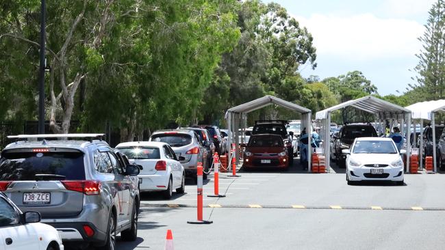 Vehicles lining up at the Bond University Drive Thru Covid testing site. Picture: Navarone Farrell