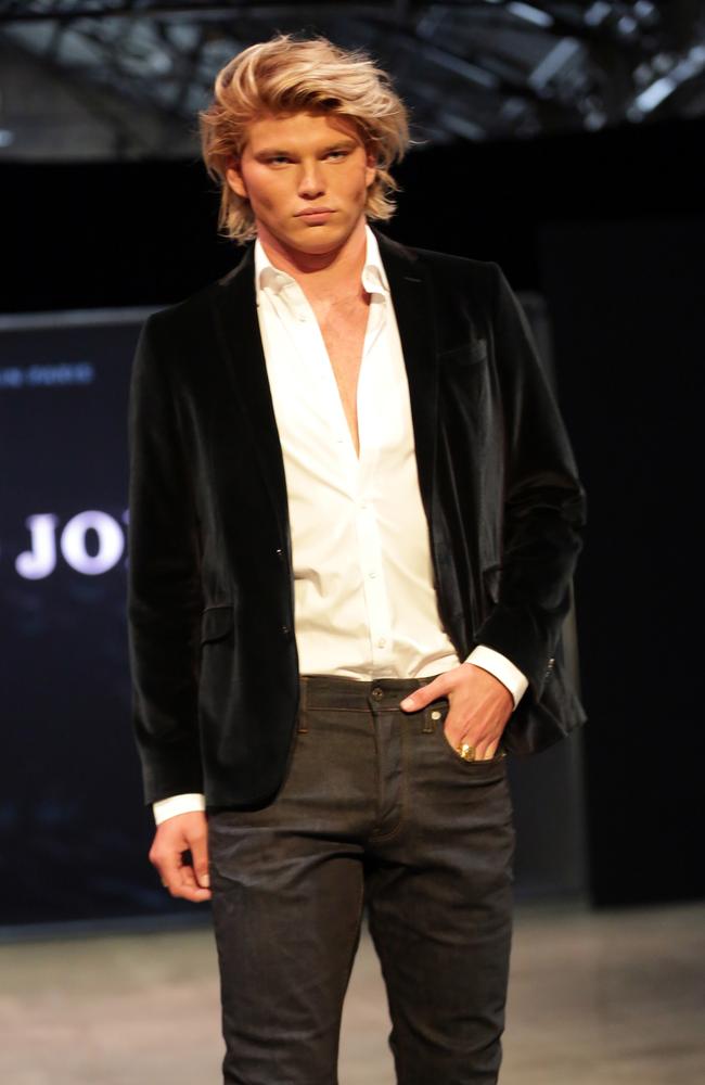 Jordan Barrett wearing a black velvet jacket, black pants and a white shirt. Picture: Christian Gilles