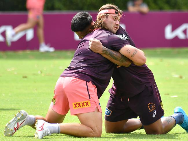 Patrick Carrigan wrestles with Payne Haas at training. Picture: John Gass