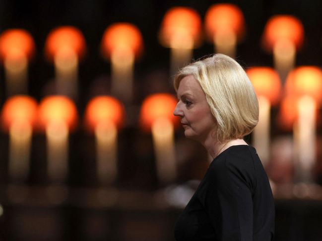 Britain's Prime Minister Liz Truss gives a reading during a Service of Prayer and Reflection for Britain's Queen Elizabeth II in London on September 9, 2022, a day after she died at the age of 96. - Queen Elizabeth II, the longest-serving monarch in British history and an icon instantly recognisable to billions of people around the world, died at her Scottish Highland retreat on September 8. (Photo by PAUL CHILDS / POOL / AFP)