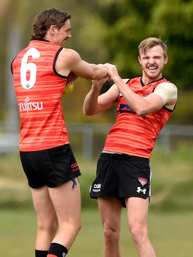 GOLD COAST, AUSTRALIA – AUGUST 10: Joe Daniher and Martin Gleeson during an Essendon Bombers AFL training session at Metricon Stadium on August 10, 2020 in Gold Coast, Australia. (Photo by Matt Roberts/Getty Images)