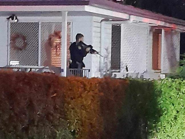 Snipers were in place at a neighbouring residence in Clinton on Monday evening after a PSPA declaration was made. Picture: Jamie Hewitt, Facebook.