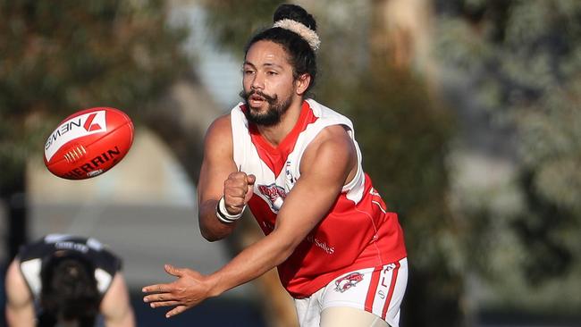 David Ismail fires off a handball for West Footscray. Picture: Local Legends Photography