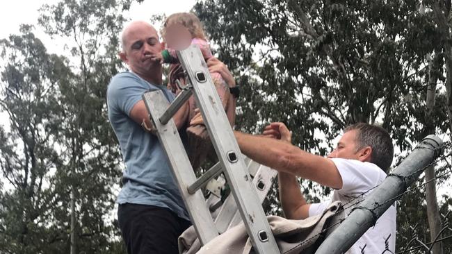 A toddler found wandering Greenbank Military Range has been reunited with her mother after being rescued by people driving by.