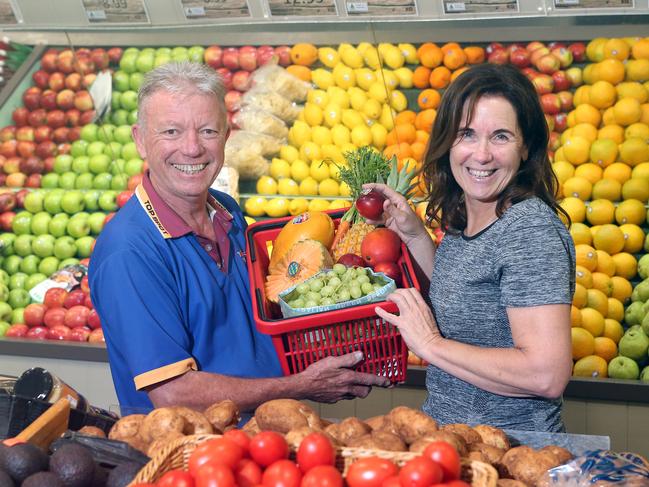 For Sunday Mail Saved By Michelle about how to do Christmas lunch cheaply by being prepared and buying produce that is in season.Barry Haskins with Lorrilee Blanning 0408060861 at Top Spot Fruit Mart.17 December 2020 Aspley Picture by Richard Gosling