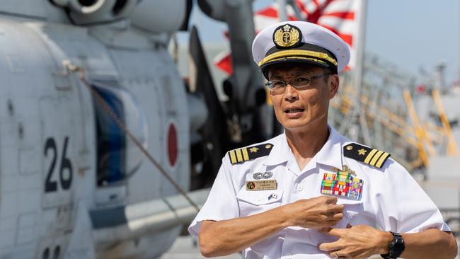 Commanding Officer of the JS Yahagi, Commander Tamura Masayoshi, speaks to media at Kuru Wharf, Darwin. Picture: Pema Tamang Pakhrin