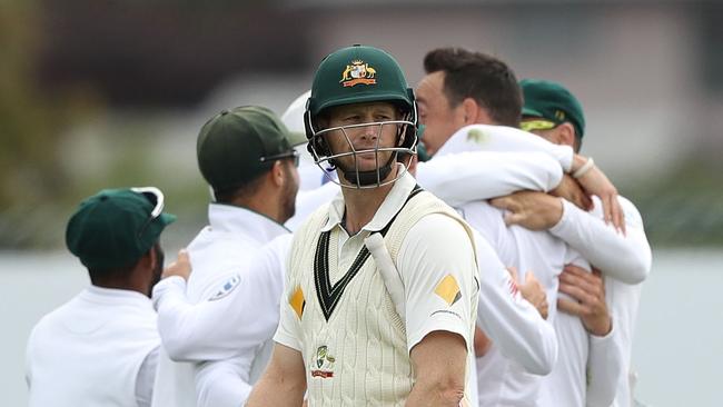 Adam Voges walks off following his dismissal.