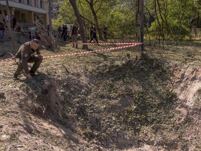 Mayor of Kyiv Vitali Klitschko looks at a crater outside a clinic following a Russian missile attack in Kyiv, Ukraine. At least three were killed, including a child. Picture: Getty Images