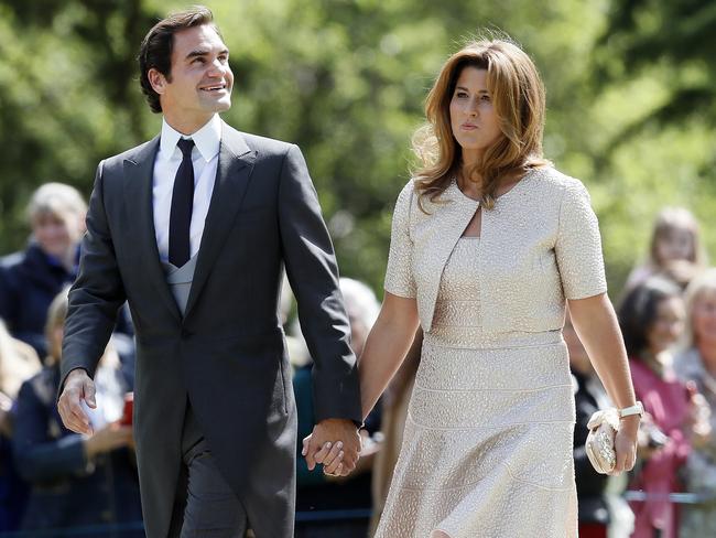 Swiss tennis player Roger Federer and his wife Mirka arrive at St Mark's Church in Englefield, England, ahead of the wedding of Pippa Middleton and James Matthews, Saturday, May 20, 2017. Middleton, the sister of Kate, Duchess of Cambridge is to marry hedge fund manager James Matthews in a ceremony Saturday where her niece and nephew Prince George and Princess Charlotte are in the wedding party, along with sister Kate and princes Harry and William. (AP Photo/Kirsty Wigglesworth, Pool)