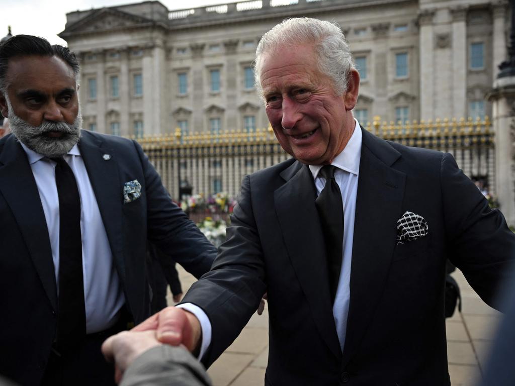 Britain's King Charles III greets the crowd at Buckingham Palace. Picture: AFP.