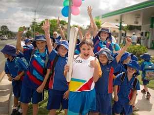 CELEBRATION TIME: Batonbearer Sage Volschenk with friends from her school during the Queens Baton Relay in Kilcoy yesterday. Picture: GOLDOC