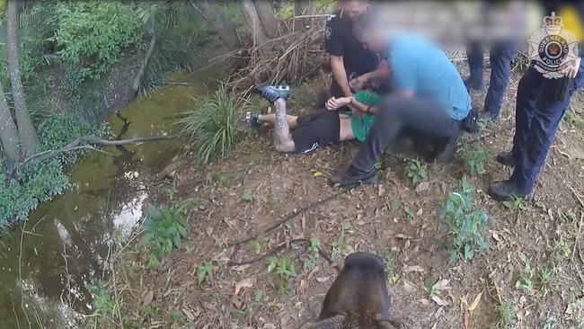 A 23-year-old man was arrested by dog squad officers in Landsborough on Wednesday and charged with offences including breaking and entering.