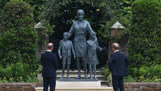 Prince William and Prince Harry unveil a statue of their mother, Princess Diana at The Sunken Garden in Kensington Palace. Picture: Dominic Lipinski/AFP