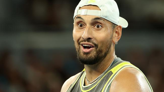 MELBOURNE, AUSTRALIA - JANUARY 16: Nick Kyrgios of Australia reacts with teammate Thanasi Kokkinakis of Australia in the Men's Doubles First Round match against James Duckworth and Aleksandar Vukic of Australia during day five of the 2025 Australian Open at Melbourne Park on January 16, 2025 in Melbourne, Australia. (Photo by Cameron Spencer/Getty Images)