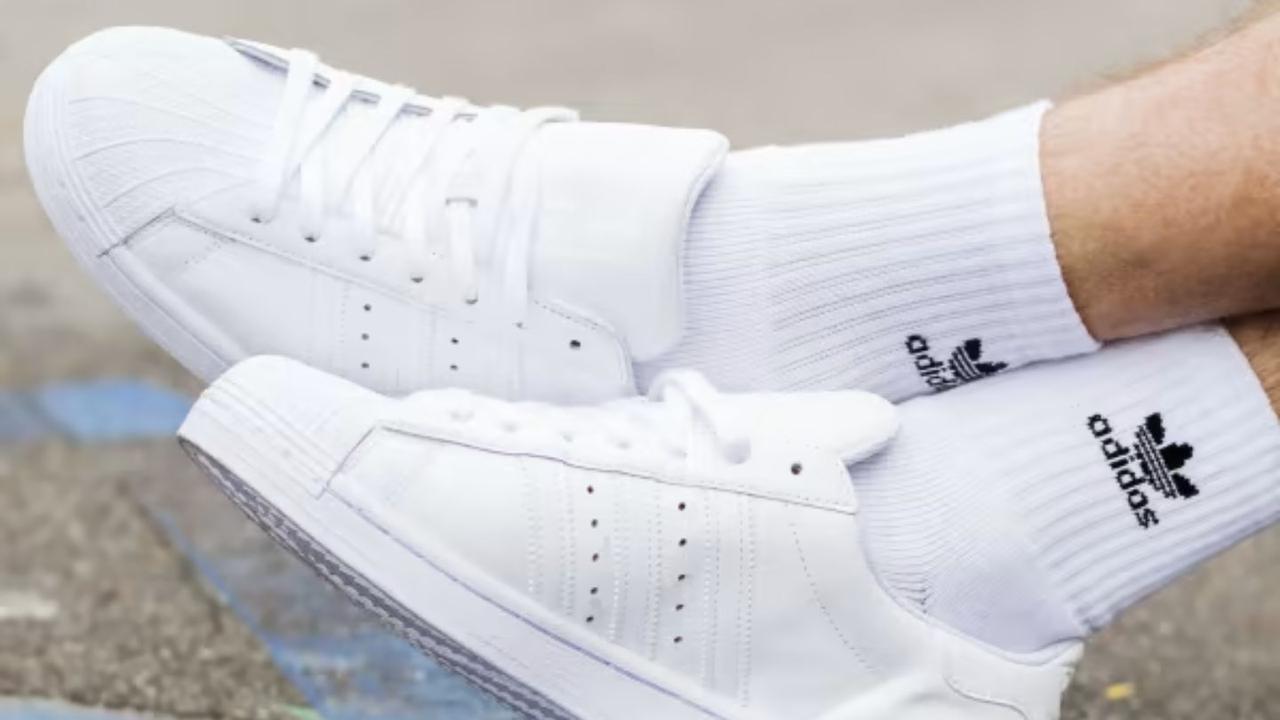 Adidas Men's Superstar Shoes pair well with athletic clothes.