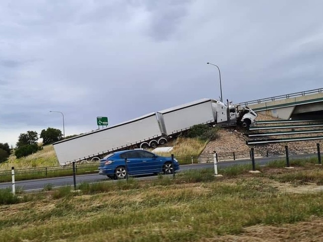 A truck came off the road on the Northern Expressway this morning. Picture: Facebook