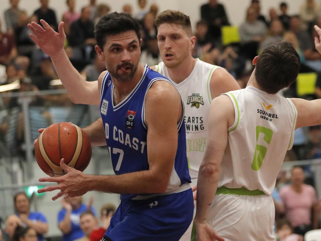 Todd Blanchfield (left) of Gold Coast Rollers tries to dribble past Michael Fleming of Ipswich Force during Game 3 decider of the NBL1 North Grand Final Series played at the Carrara Indoor stadium, Gold Coast, Sunday, August 6, 2023. Photo: Regi Varghese