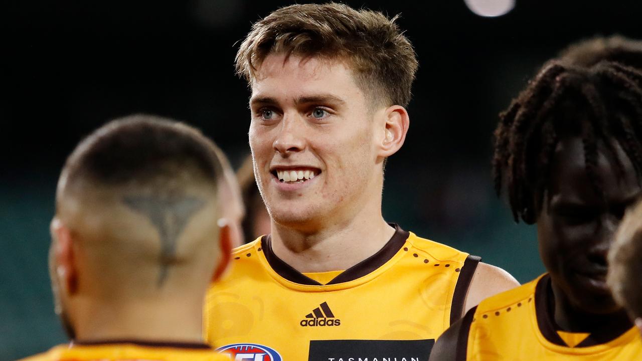 Injured Hawk Will Day celebrates the win against Brisbane. Picture: Dylan Burns/AFL Photos via Getty Images