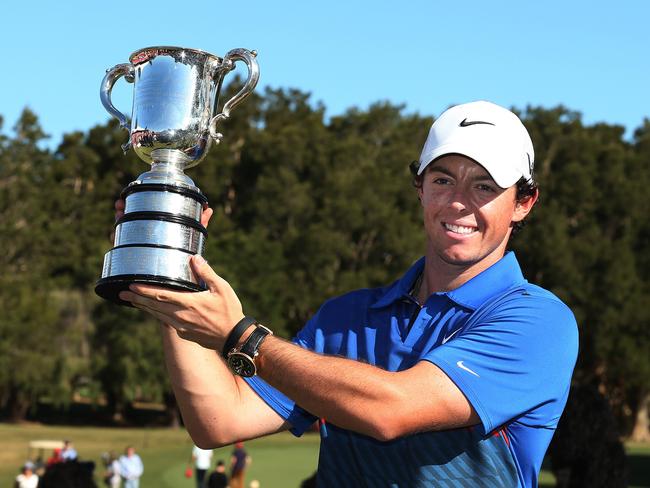 Rory McIlroy of Ireland with the Stonehaven Cup winner of the 2013 Emirates Australian Open Golf Championship at Royal Sydney Golf Course. pic. Phil Hillyard