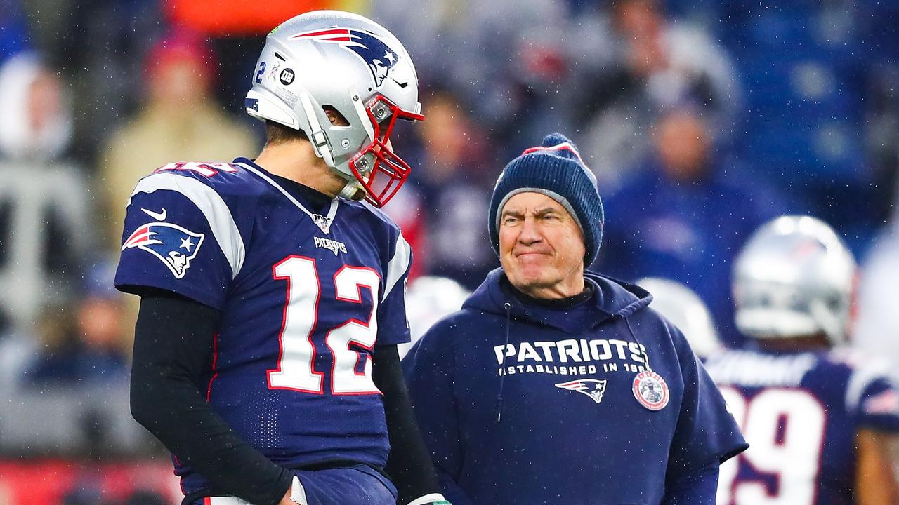 Tom Brady is reported to have left the Patriots due to a strained relationship with coach Bill Belichick. (Photo by Adam Glanzman/Getty Images)