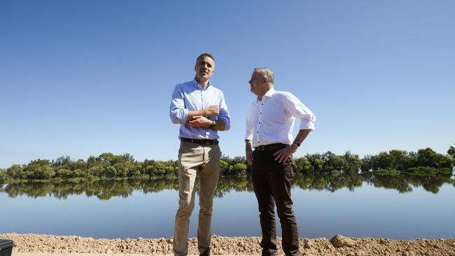 South Australian Premier Peter Malinauskas and the Prime Minister Anthony Albanese stand upon Hospital Bank Levee in Renmark.