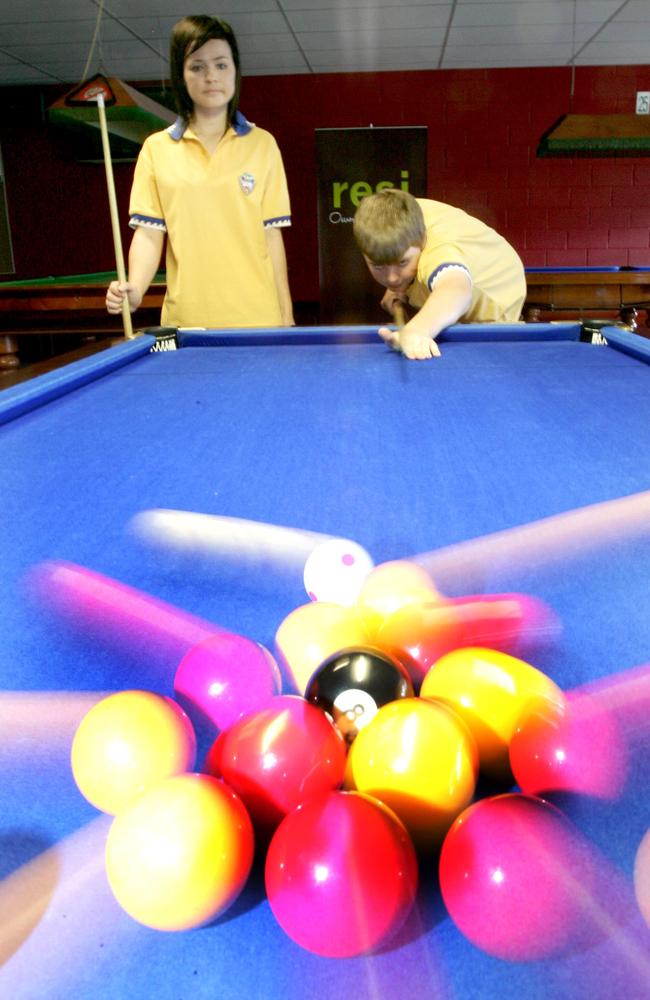 Then-Miami State High School students Monique Goode and Dylan Bond playing at Snooker World at Mermaid Beach in 2007