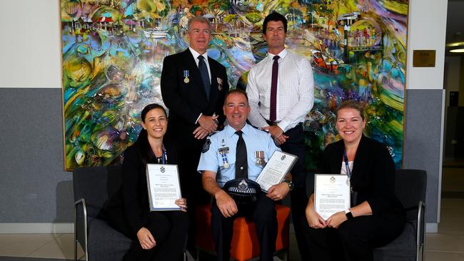 QPS officers and staff members were presented with medals and awards at a ceremony held at the Upper Coomera Community Centre: Pictured: Senior Constable Kelly Abrams, Detective Superintendent Brian Swan, Senior Constable Nick White, Detective Senior Sergeant Simon Garrett and Senior Constable Marie Sawtell. Picture: David Clark