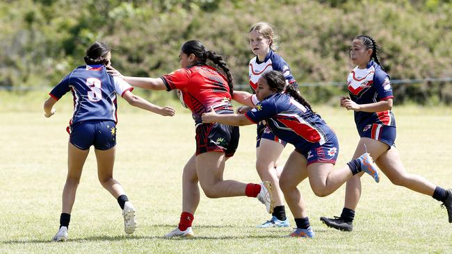 Action from 16 Girls Tonga v Philippines. Harmony Nines Rugby League. Picture: John Appleyard