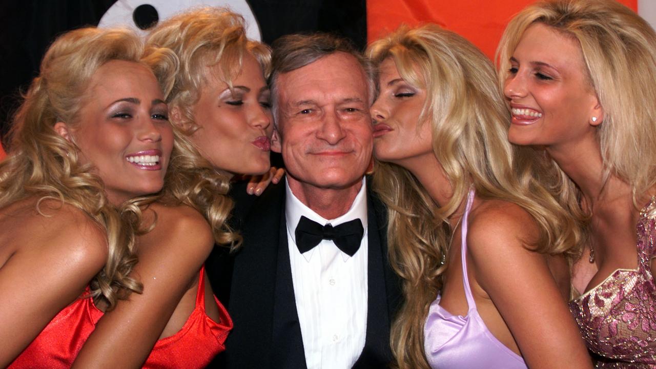 Hef surrounded by his playmates in Cannes 1999. Picture: AP Photo/Laurent/Rebours