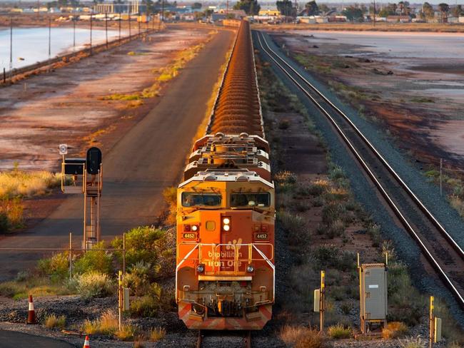 A BHP freight train carrying Australian iron ore to port. Australia ships around a third of its overall exports to China. Picture: Ian Waldie/Bloomberg News