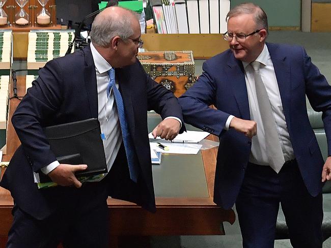 CANBERRA, AUSTRALIA - DECEMBER 10:  Prime Minister Scott Morrison and Leader of the Opposition Anthony Albanese bump elbows at the conclusion of Question Time in the House of Representatives at Parliament House on December 10, 2020 in Canberra, Australia. The Morrison government will seek to abolish the Ã¢â¬Åbetter off overall testÃ¢â¬Â for prospective enterprise agreements under its omnibus industrial relations package. (Photo by Sam Mooy/Getty Images)