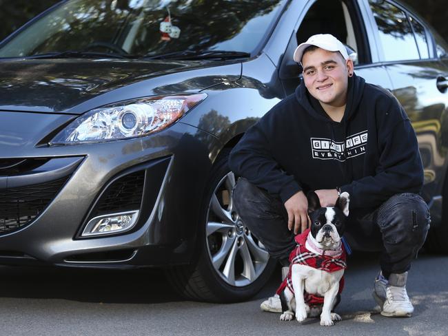 Matthew Giusa, with his dog Ellie, wants to become an auto-mechanic. Picture: Justin Lloyd