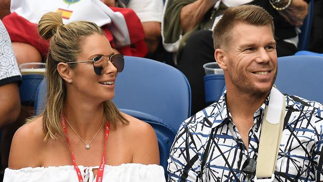 Australian cricketer David Warner (right) and partner Candice Warner are expecting their third child