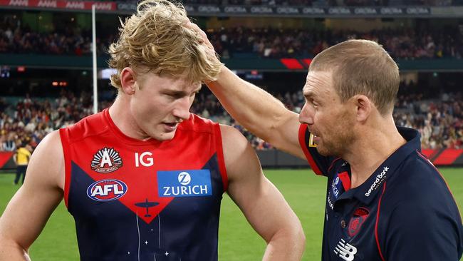 Jacob van Rooyen is congratulated by Simon Goodwin post-game. Picture: Michael Willson/AFL Photos via Getty Images