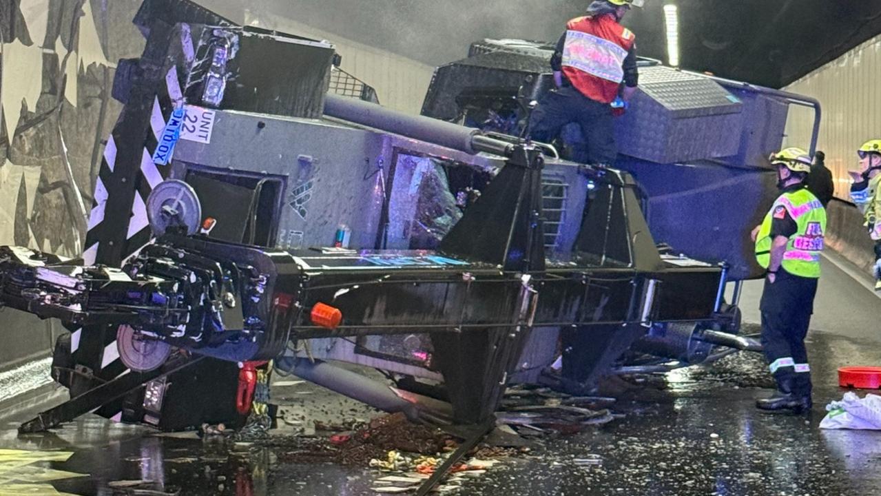 Chaos on Sydney’s M5 after crane crash