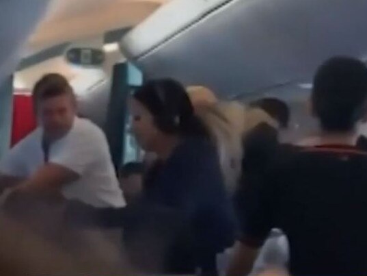 The fight broke out just two hours into the flight. Picture: 9 News