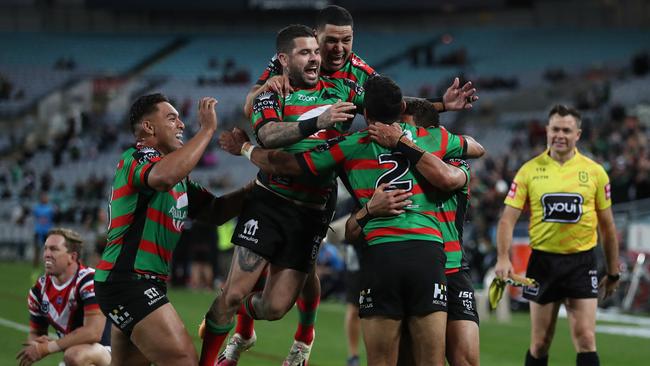 Souths players celebrate after Souths Alex Johnston scores his 5th try during the Souths v Roosters NRL match at ANZ Stadium, Homebush. Picture: Brett Costello