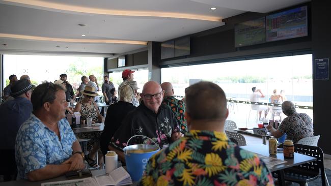 Punters watch the races at Darwin Turf Club. Picture: (A)manda Parkinson