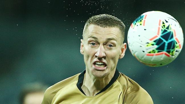 Mitchell Duke of the Wanderers heads the ball. Picture: Getty Images