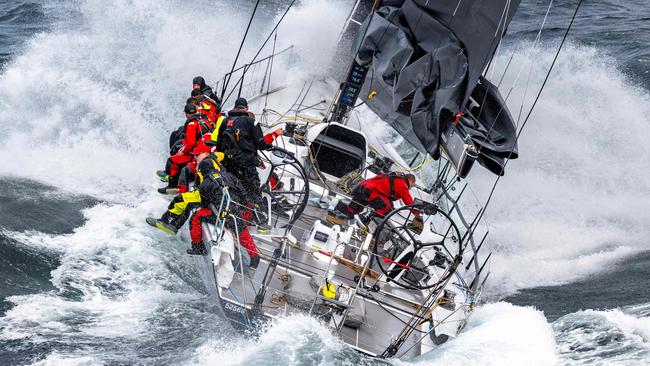 This handout image taken on December 28 and received from Rolex on December 30, 2023 shows the yacht Alive during the annual Sydney to Hobart yacht race in Hobart. Australian yacht Alive was December 30 crowned the overall winner of the prestigious Sydney-Hobart race, overcoming perilous storms that forced several damaged competitors to retire. (Photo by Kurt Arrigo / ROLEX / AFP) / RESTRICTED TO EDITORIAL USE - MANDATORY CREDIT "AFP PHOTO / ROLEX / KURT ARRIGO" - NO MARKETING NO ADVERTISING CAMPAIGNS - DISTRIBUTED AS A SERVICE TO CLIENTS - NO ARCHIVE