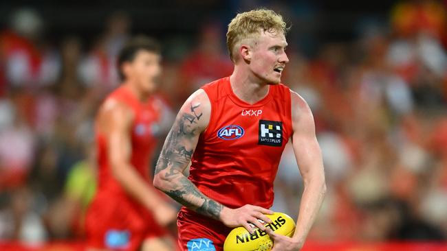 John Noble of the Suns looks to kick during the 2025 AAMI AFL Community Series match between Gold Coast Suns and Sydney Swans. Photo: Matt Roberts/AFL Photos/via Getty Images.