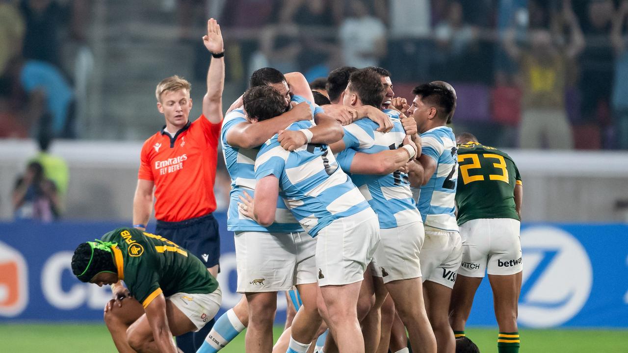 Argentine players celebrate after winning the rugby union Championship match between Argentina's Pumas and South Africa's Springboks, at the Madre de Ciudades stadium in Santiago del Estero, Argentina.