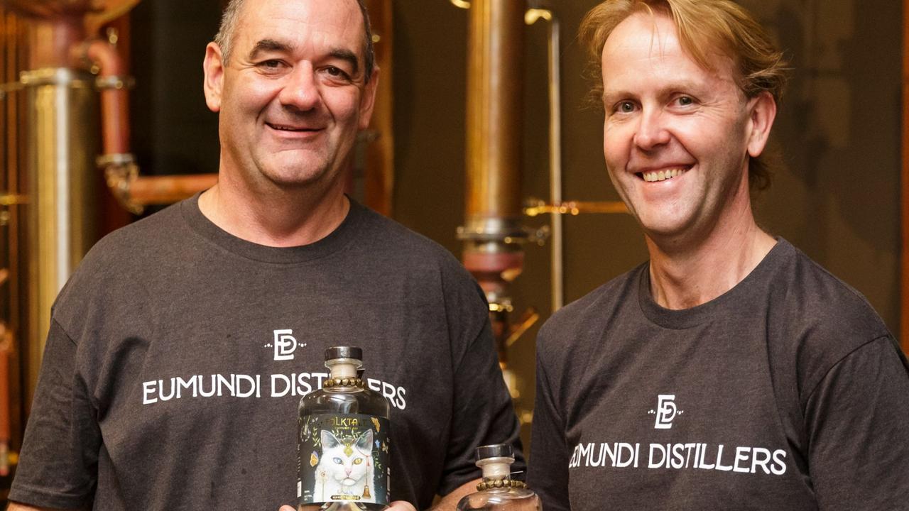 Imperial Hotel manager Paul Thomas, left, and head distiller Mick Reif with their new lines of gin.