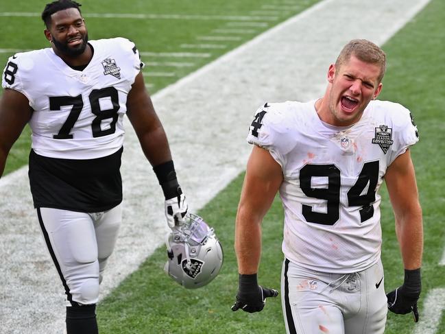 Carl Nassib (right) is thankful for all the support he's received from the football world (Photo by Jamie Sabau/Getty Images).